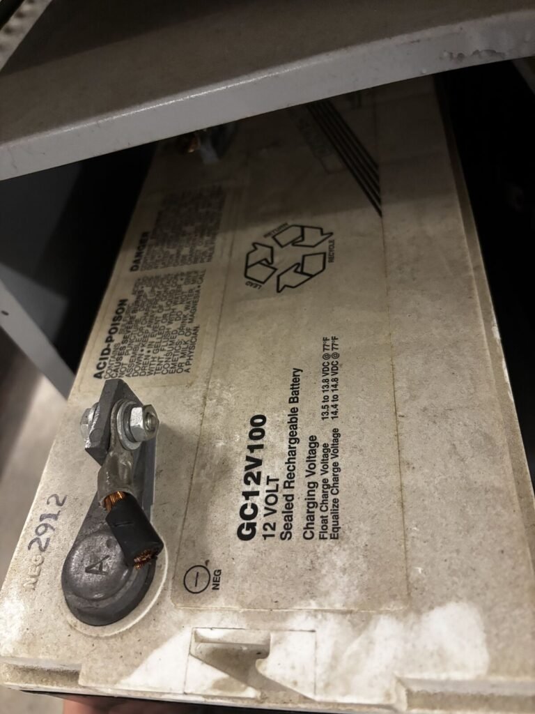 Battery Bank Lot — 12V Sealed Lead-Acid Batteries in Steel Rack